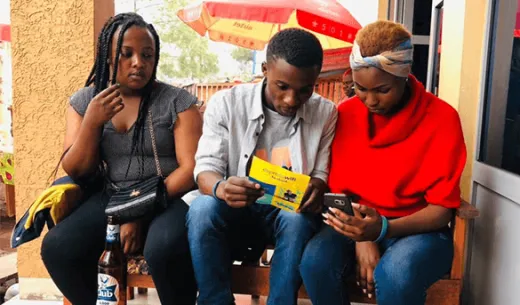 Three people connecting to a Konnect Wi-Fi Hotspot